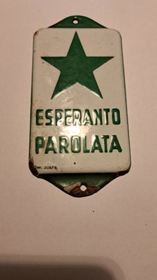 Skilte, Emaljeskilt, Emalje skilt 
" esperanto parolata"

Afslag- se foto

6,2x12,5 cm