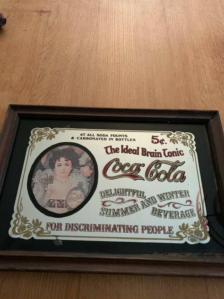 Coca Cola, Spejl reklame skilt