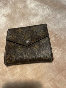 Louis Vuitton - Taiga Portefeuille Brazza - Wallet - Catawiki