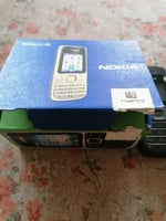 Nokia C2- 01 med oplader. Jeg kan ikke forestil...
