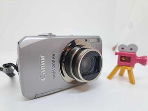 Canon PowerShot IXUS 230 HS / ELPH 310 12.1 MP Digital Camera -purple,worker