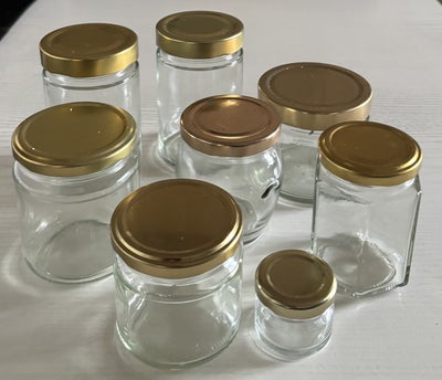Glas, Glas med "guld" låg, 8 stk. små glas med "guld" skruelåg ( 2 stk. 11,5 cm, 2 stk.9 cm, 1 stk. 