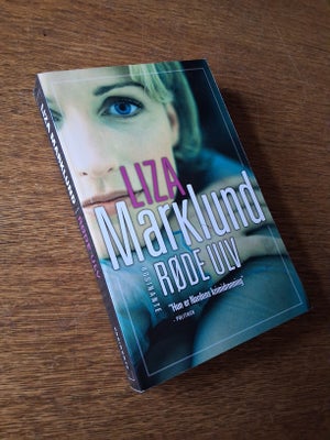 RØDE ULV, LIZA MARKLUND, genre: krimi og spænding, Annika Bengtzon finder ud af, at den legendariske