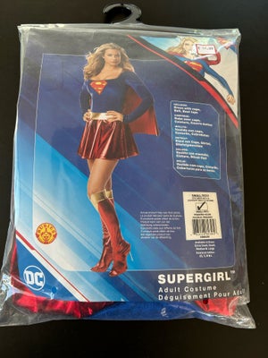 Supergirl udklædning, Kostume Supergirl, er ubrugt og ekstra dele til kjolen er ikke pakket ud. 
Kjo