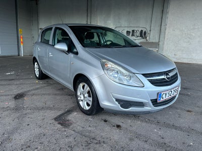 Opel Corsa, 1,4 16V Cosmo, Benzin, 2009, km 209000, sølvmetal, aircondition, ABS, airbag, 5-dørs, ce