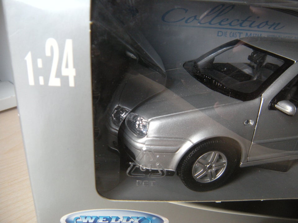 Modelbil, WELLY Golf IV, skala 1.24