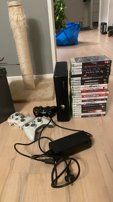 Xbox 360 Slim, 1439, God, Xbox 360 with 250 GB harddisk, three controllers and 22 games. Works like 