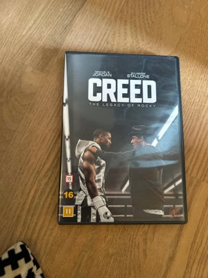 Creed , DVD, drama, I meget fin stand. 

Jeg sender kun med DAO. Det koster 40 kr uanset købt antal 