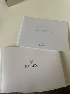 Andet, Rolex, Dansk rolex katalog fra 2013 samt tilhørende prisliste. 

I super kvalitet uden løse e