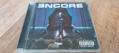 Eminem: Encore, hiphop, /Pop Rap/Conscious. Fra 2004.
Indeholder følgende 20 numre:
1 Curtains Up (0