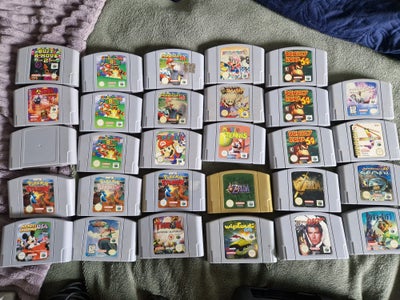 En masse n64 spil, N64, anden genre, Nintendo 64 med 2 controller Kabler og rumblepak - 815
Bust a m