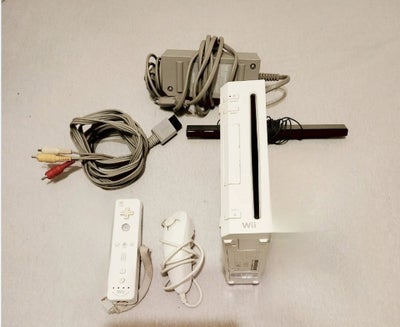 Nintendo Wii, Nintendo Wii pakke med alle kabler. 
Wii controller med Wii motion plus
Nunchuk
Slikon