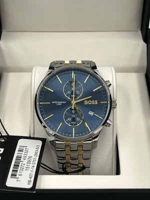 Herreur, Hugo Boss, BOSS ASSOCIATE 1513976
Dette BOSS er et moderne ur i et two-tone look med en flo
