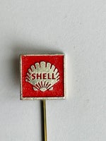 Emblemer, Shell nål