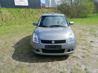 Suzuki Swift, 1,3 GL-A, Benzin, 2005, km 305000, gråmetal, nysynet, ABS, airbag, 5-dørs, centrallås,