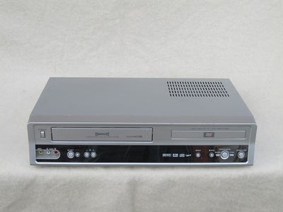VHS videomaskine, 

MAGNUM,
-Model: DVC 8000

- Combi,
- DVD-afspiller / VHS-video,
- 6 Head,
- Hi-F