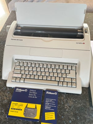 Elektrisk skrivemaskine, Olympia. Har aldrig været brugt. Købt for ca. 7 år siden. 
Der er et ekstra