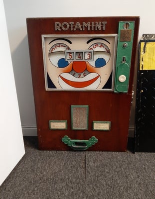Rotamint, spilleautomat, Defekt, Tysk spilleautomat med sjov klovnehoved som ruller med øjnene når d