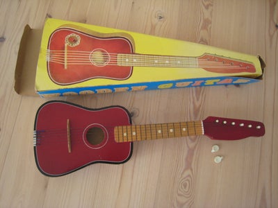 Andet legetøj, Guitar, Retro, Fin træ guitar fra 70'erne til leg.
Der er knækket to af de dele til a