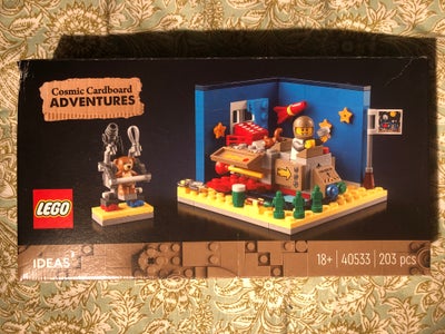 Lego Ideas, 40533, Kosmiske papkasse-eventyr
Cosmic Cardboard Adventures
It's new and unopened. But 