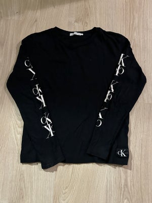 T-shirt, Bomuld, Calvin Klein, str. 152, Rigtig fin sort Calvin Klein t-shirt med lange ærmer.