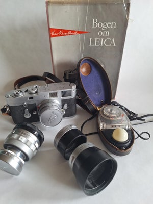 Leica, M2Q, God, Kameraet er købt først i tresserne ,næsten ikke brugt. Der med følger modlys blænde