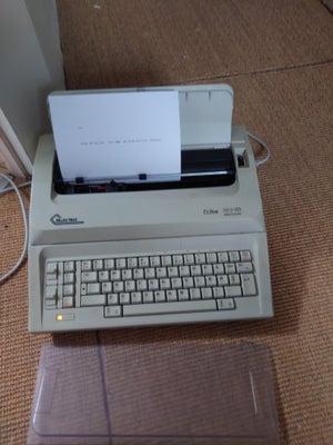 Elektronisk skrivemaskine, Multinet Erika 3015

Lækker elektrisk skrivemaskine der virker som den sk