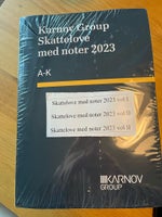 Skattelove med noter 2023, Karnov Group, år 2023