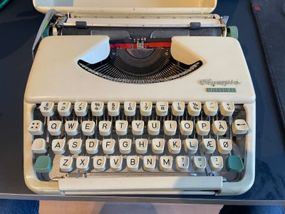 Skrivemaskine, Olympia, Olympia Splendid 33 skrivemaskine. Lidt brugsspor men intet slemt. Virker st