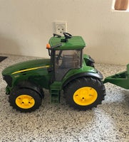 Traktor med ballepresser , John Deere