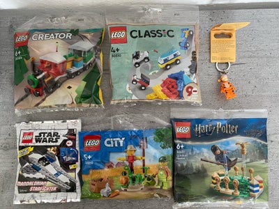 Lego blandet, Nye og uåbnede poser samt nøglering.

Sælges kun samlet til 150 kr.

Star Wars 912287
