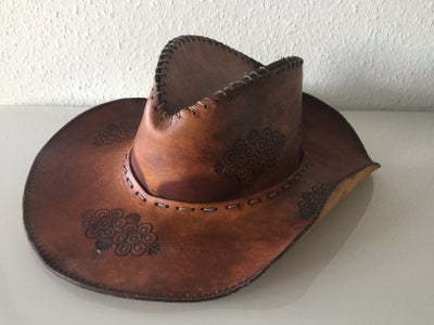 Hat, Cowboyhat
Cowboy hat
Ægte læder
Hat
Læder
Læderhat
Brun
Vintage
Retro
Rubust
Antik

Kender ikke