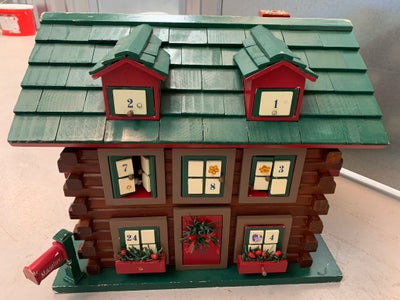 Julekalender hus, Det sødeste julekalender hus, med plads til 24 små gaver i skuffer og låger. Huset