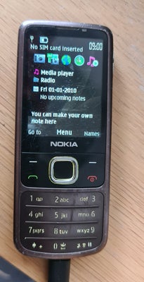 Nokia 6700c, Rimelig, Vintage Nokia knaptelefon. Støvet og ridset, men virker fint - ægte Nokia kval