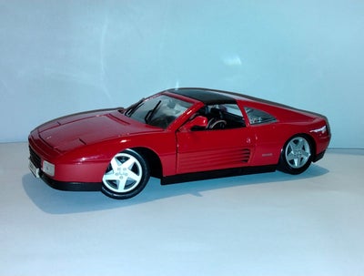 Modelbil, Ferrari, Velholdt :) sendes også på køberens regning, ellers byd.