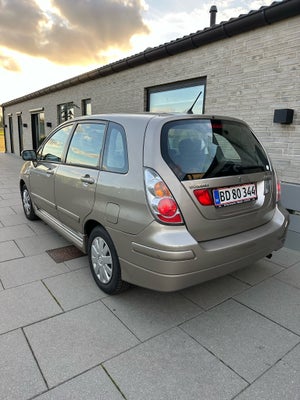 Suzuki Liana, 1,6, Benzin, 2008, km 202000, beigemetal, 5-dørs, Nysynet september 2024 nyserviceret 