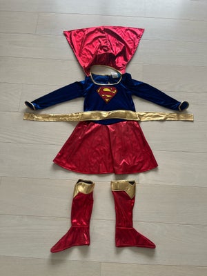 Supergirl børnekostume, Udklædningstøj til børn i perfekt stand. Størrelsen 110-122 (5-7 år).

- Off