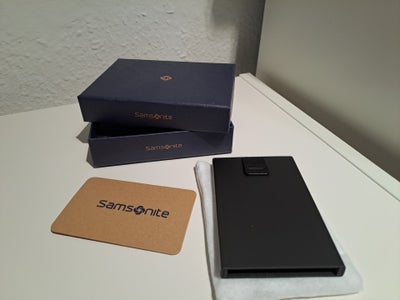 Kortholder, Samsonite, 

Samsonite Alu Fit RFID Wallet - Anthracite kreditkortholder

Ny - aldrig br