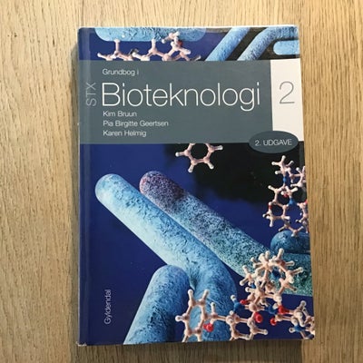 Grundbog i Bioteknologi 2 STX, Kim Bruun m.fl., år 2019, 2. udgave, Pæn og ren bog, der er plastet/i