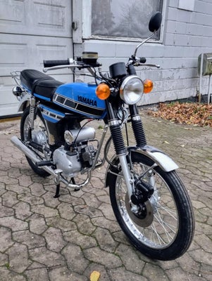 Yamaha FS1 4 gear Veteran, 1978, Blå, Yamaha FS1 DX (4 gears) 
30 knallert VETERAN 
Årgang 1978.

Kn