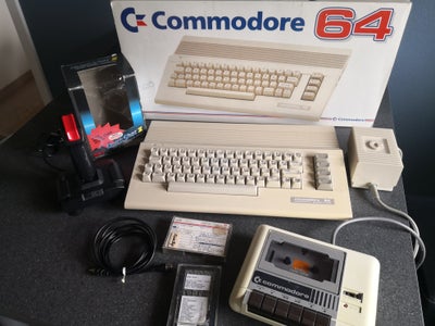 Commodore 64c, spillekonsol, Først til møllen pris. Tak.
Super fin og flot C64c - som ny.
Original e