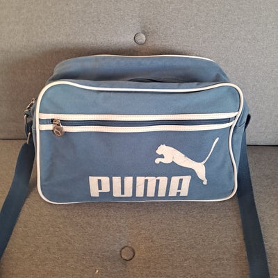 Rejsetaske, Puma, Selling this faded blue colored puma shoulderbag. Relatively roomy. Can fits gym e