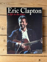 Paperback, Eric Clapton a life in the blues