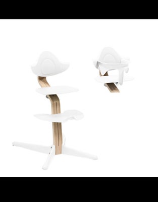 Højstol, Nomi, Komplet Nomi højstol i hvid. Der medfølger babyindsats, pude, sele, bord og bøjle. 

