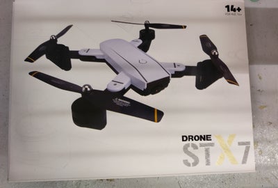 Fjernstyret fly, STX7  Drone , skala 1/10, hejsa jeg har en hel ny fjernstyret drone den blev købt i