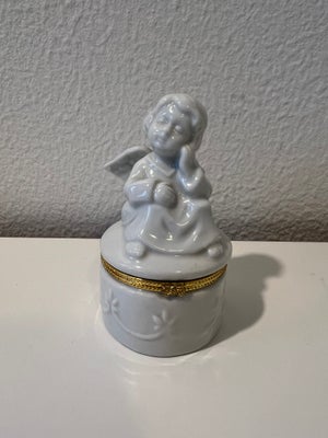 Skrin, Porcelæn. 
Med engel. 
H 11 cm. 
Ø 6 cm. 