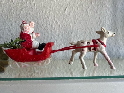 Retro  julepynt, Retro julemand i kane. En del af farven på julemand og rensdyr er skallet af grunde