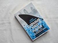 Svømme med hajer []