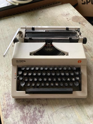 Retro skrivemaskine, Vintage Olympia skrivemaskine. Retro og nostalgi til hjemmekontorets indretning