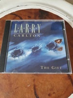Larry Carlton: The Gift, pop